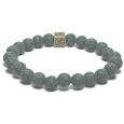 Láva temně zelená s královskou mantrou Óm, náramek elastický přírodní kámen, kulička 8 mm / 16 - 17 cm, zrozen ze čtyř živlů