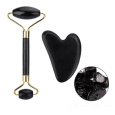 Obsidian Gua Sha 5 x 8 cm + váleček masážní 14 x 5,5 cm redukuje vrásky, otoky, zlepšuje pružnost pokožky, sada bez obalu