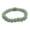 Láva světle zelená s královskou mantrou Óm, náramek elastický přírodní kámen, kulička 8 mm / 16 - 17 cm, zrozen ze čtyř živlů