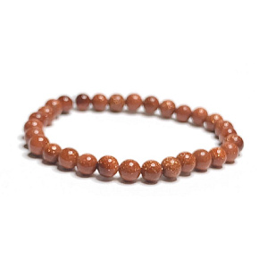 Goldstone zlatý náramek elastický, kulička 6 mm / 16 - 17 cm, kámen ambicí