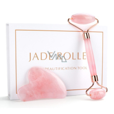 Różowy Gua Sha 5 x 8 cm + wałek do masażu 14 x 5,5 cm redukuje zmarszczki, obrzęki, poprawia elastyczność skóry, zestaw